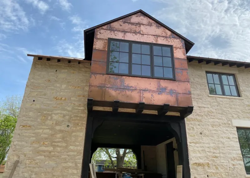 Copper metal panel facade on a stone building for Metal Roof Coating in Orangevale